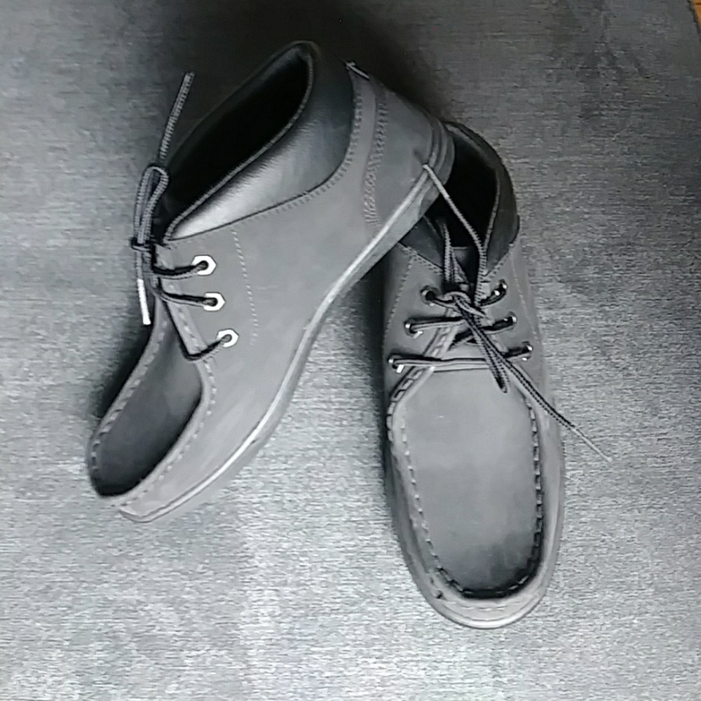 Never used. Stylish suede chukka boots.